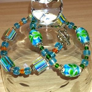 Blue orange and green bracelets wear together or apart glass with toggle clasp